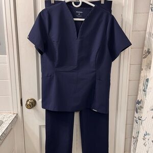 Jaanuu Women's Calix Fit and Flare Top  Matching Straight Leg Pants in Navy